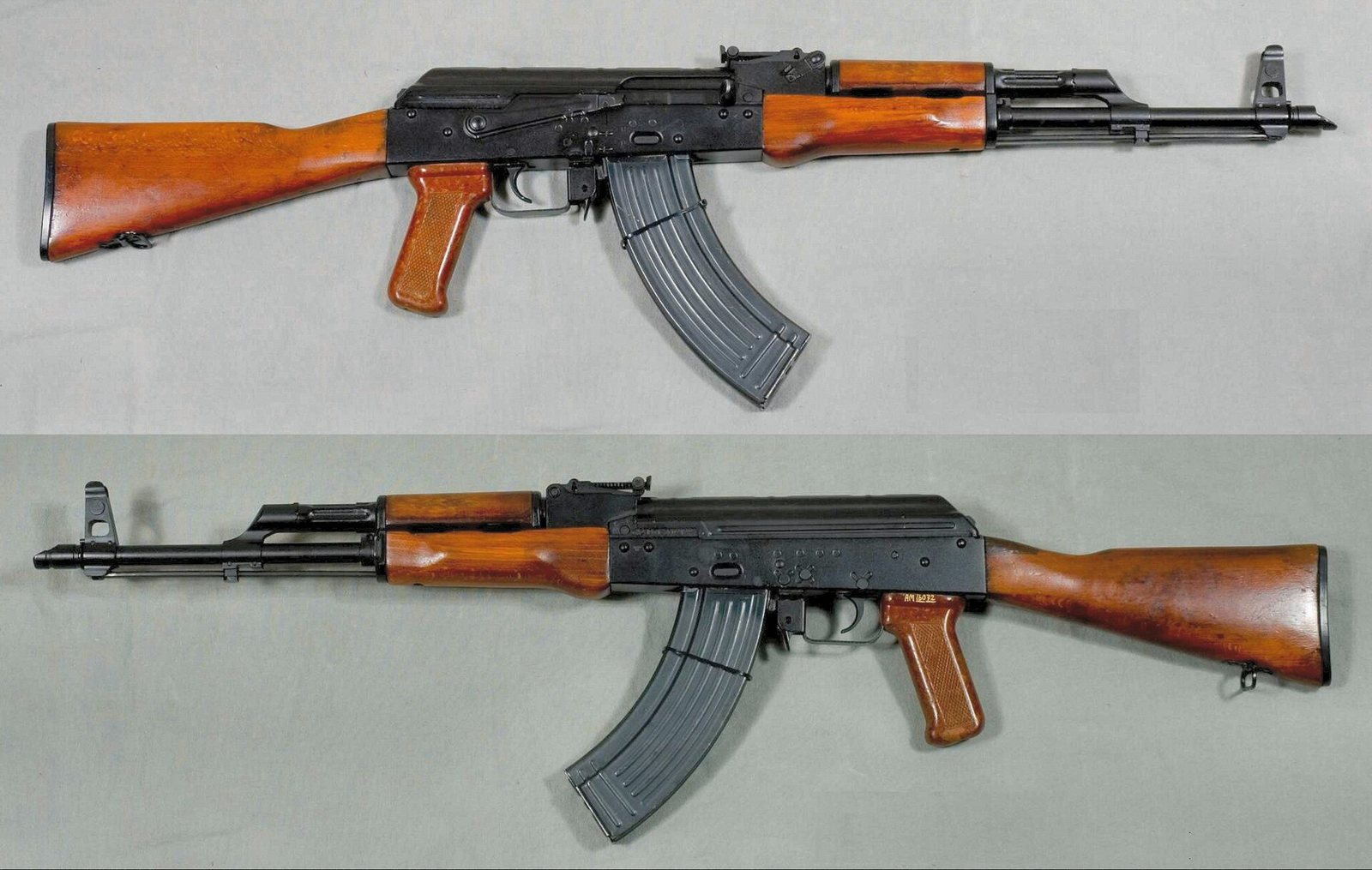 A 1971 Soviet AKM, both sides. Note the stamped receiver and slant compensator.