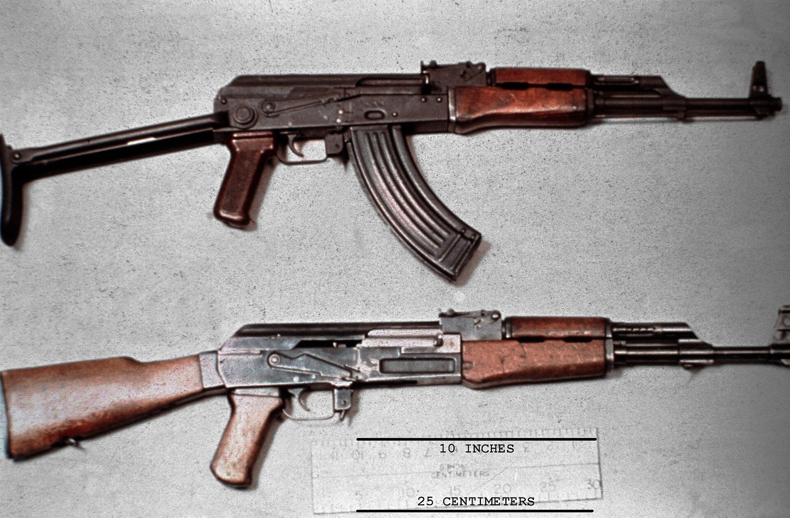 AKMS with folding stock (top) and a standard milled AK (bottom), 1984.
